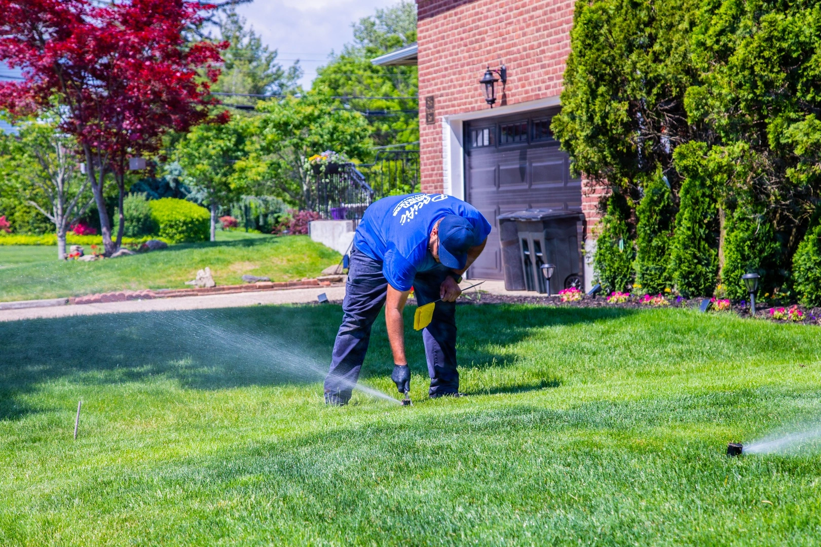 Technician installing a sprinkler system