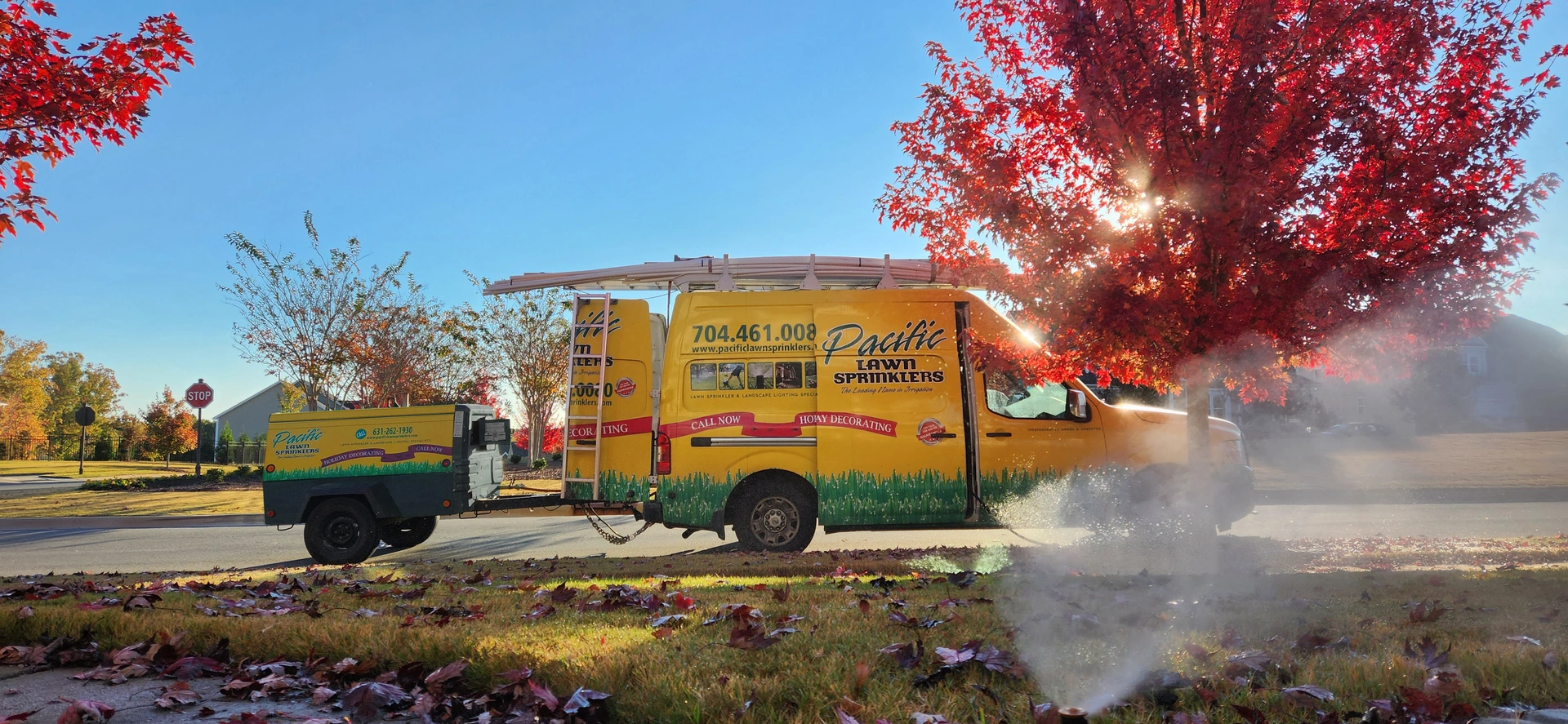 Technician winterizing a sprinkler system